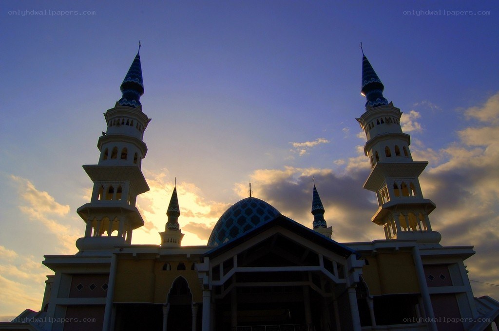 mosque at sunset with minarets