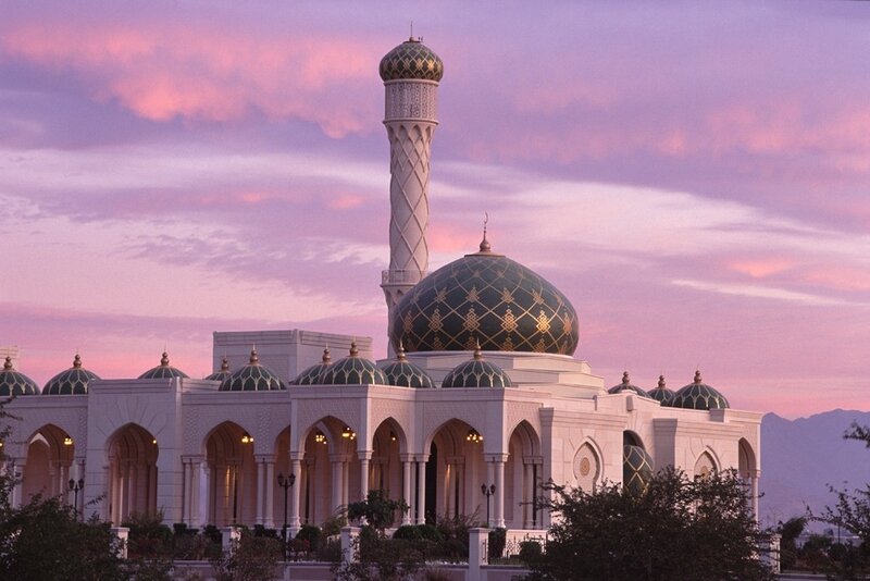 mosque at sunset with pink sky