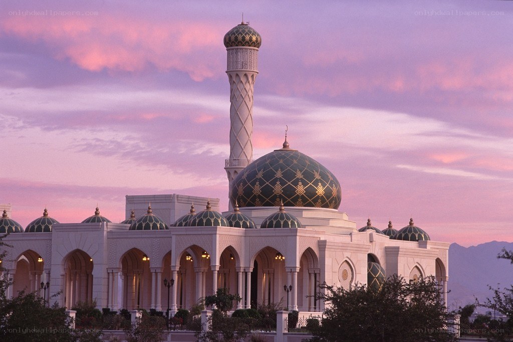 mosque at sunset with pink sky