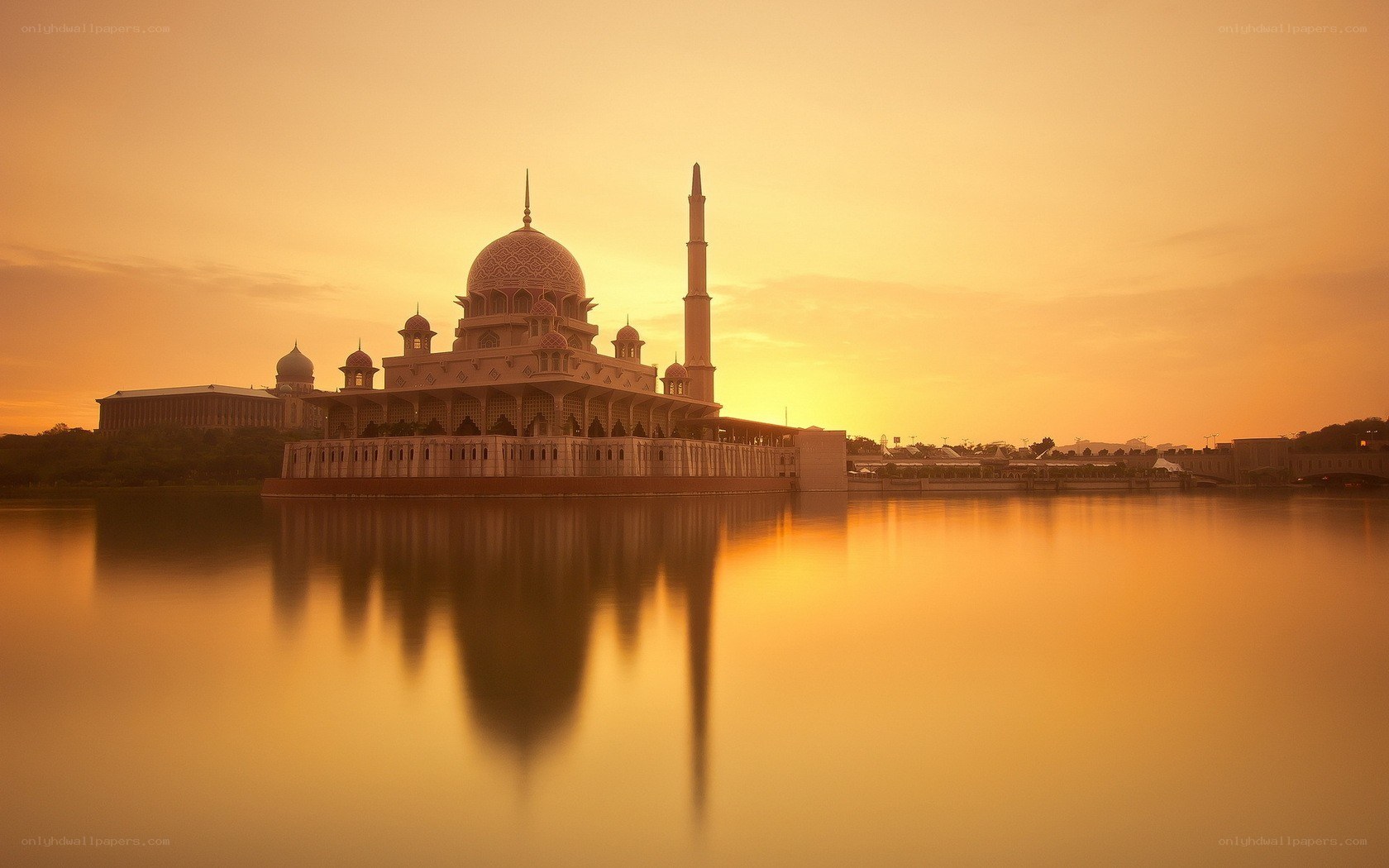 mosque at sunset with reflection