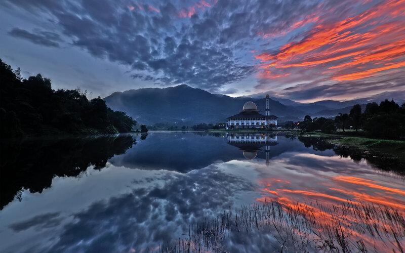 Mosque by Lake at Sunrise