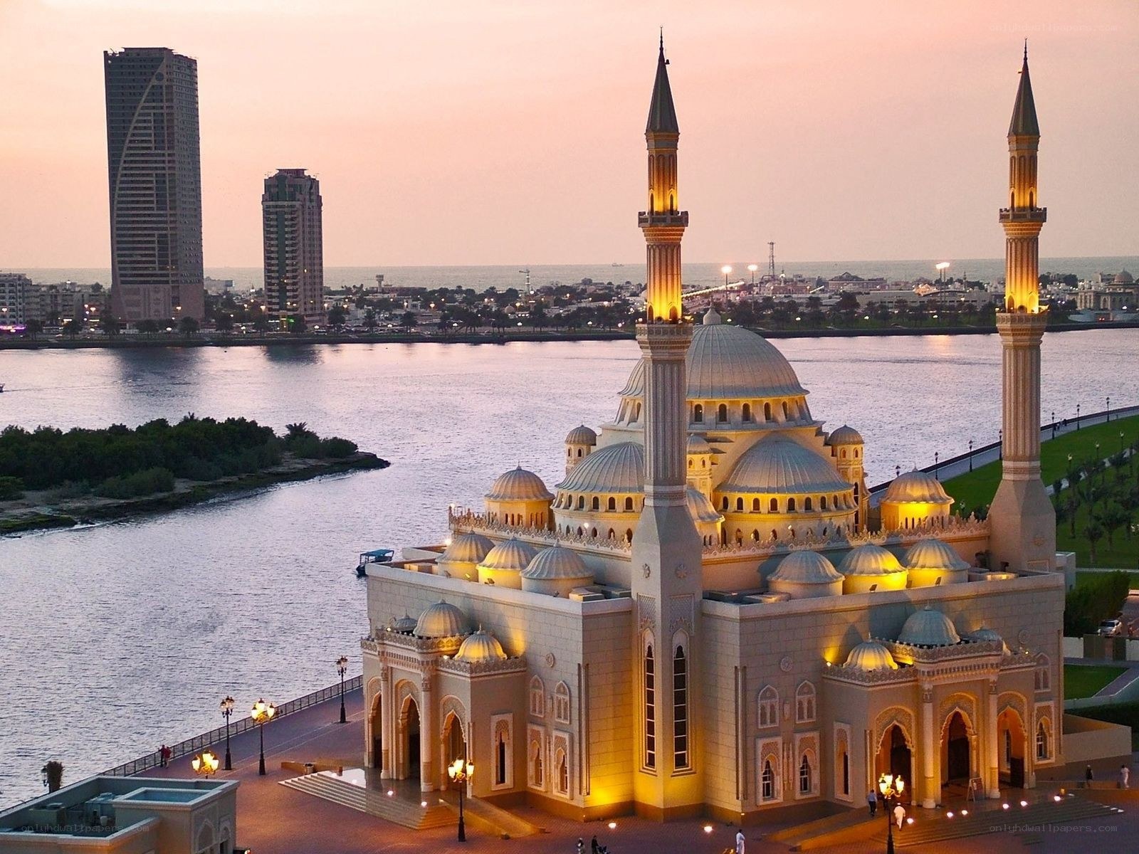 mosque by the water at dusk