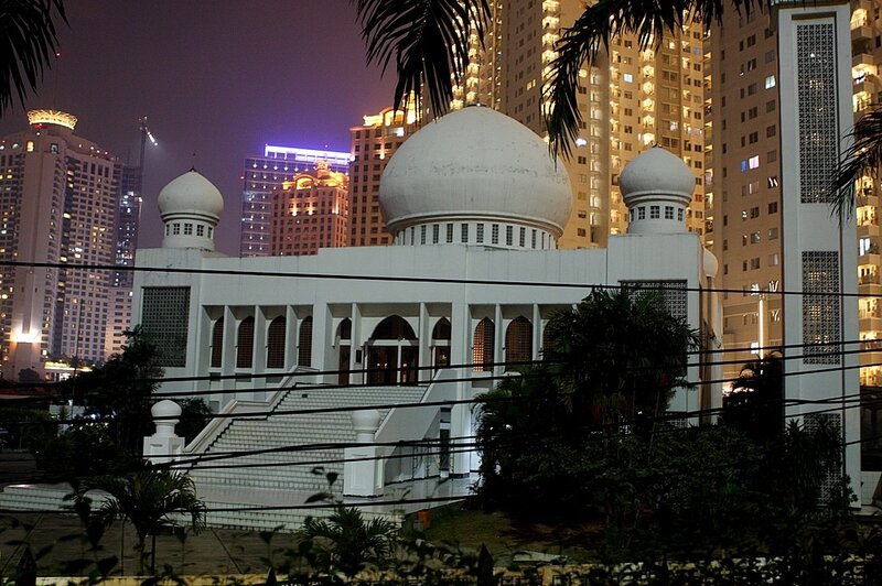 mosque in city at night