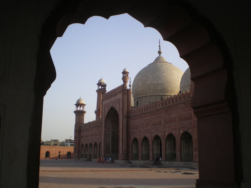 mosque viewed through an arch