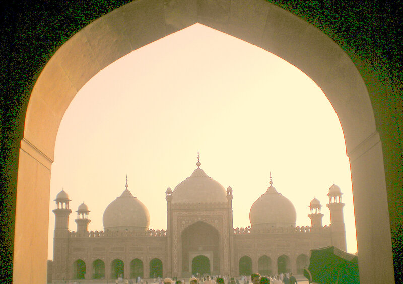 mosque viewed through an arch