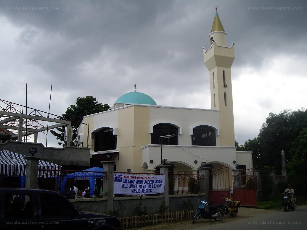 Mosque with blue dome and minaret
