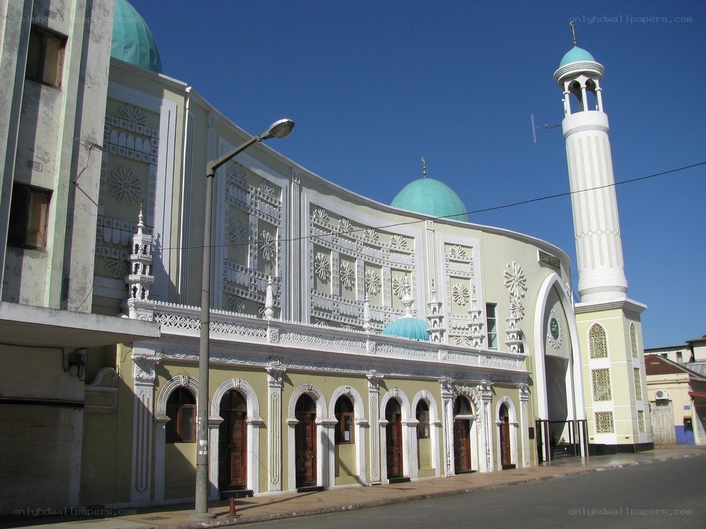 Mosque with blue domes and minaret