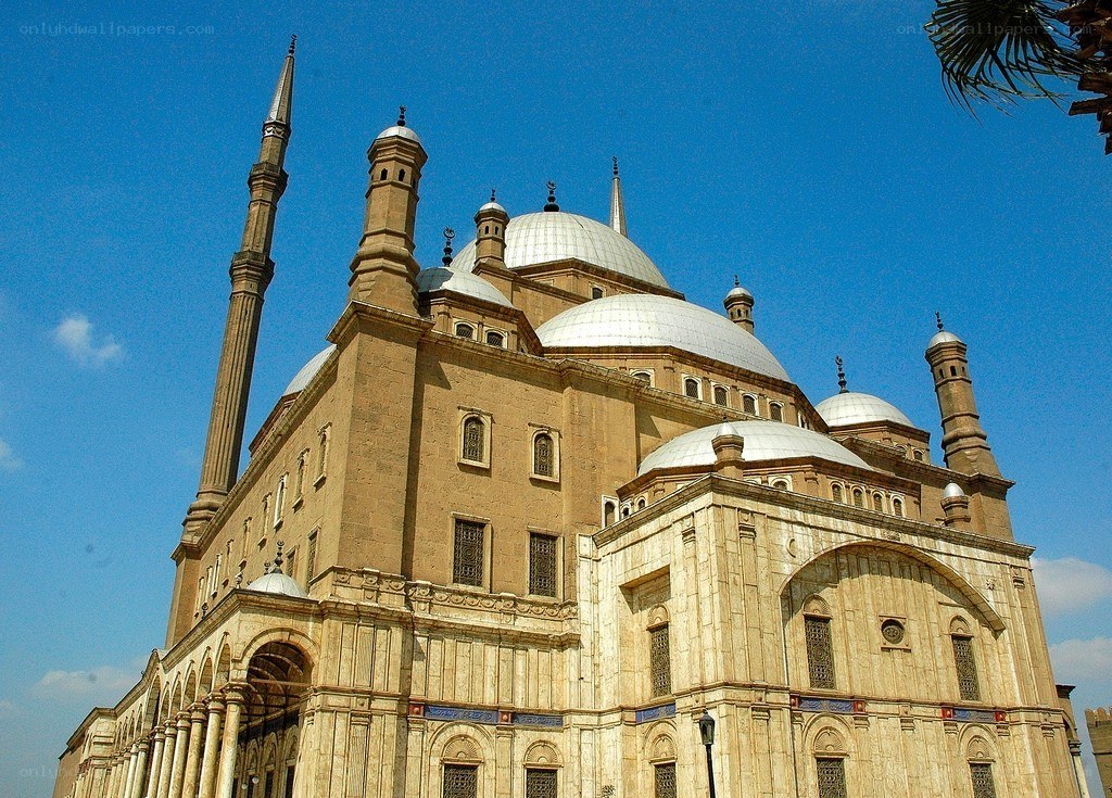 Mosque with domes and minaret