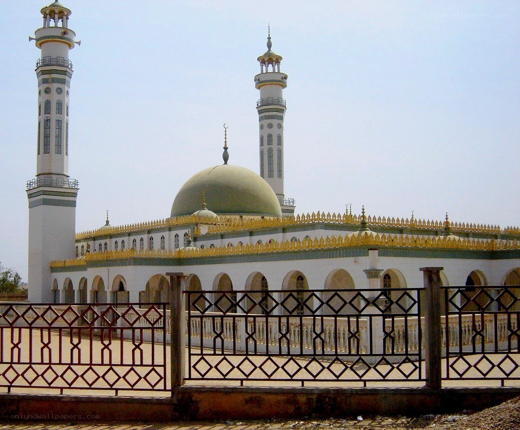mosque with green dome and minarets