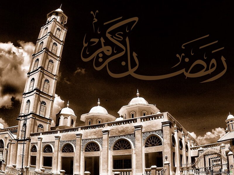 Mosque with minaret and calligraphy