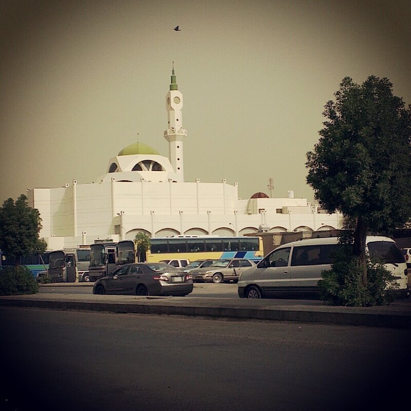 Mosque with minaret and traffic