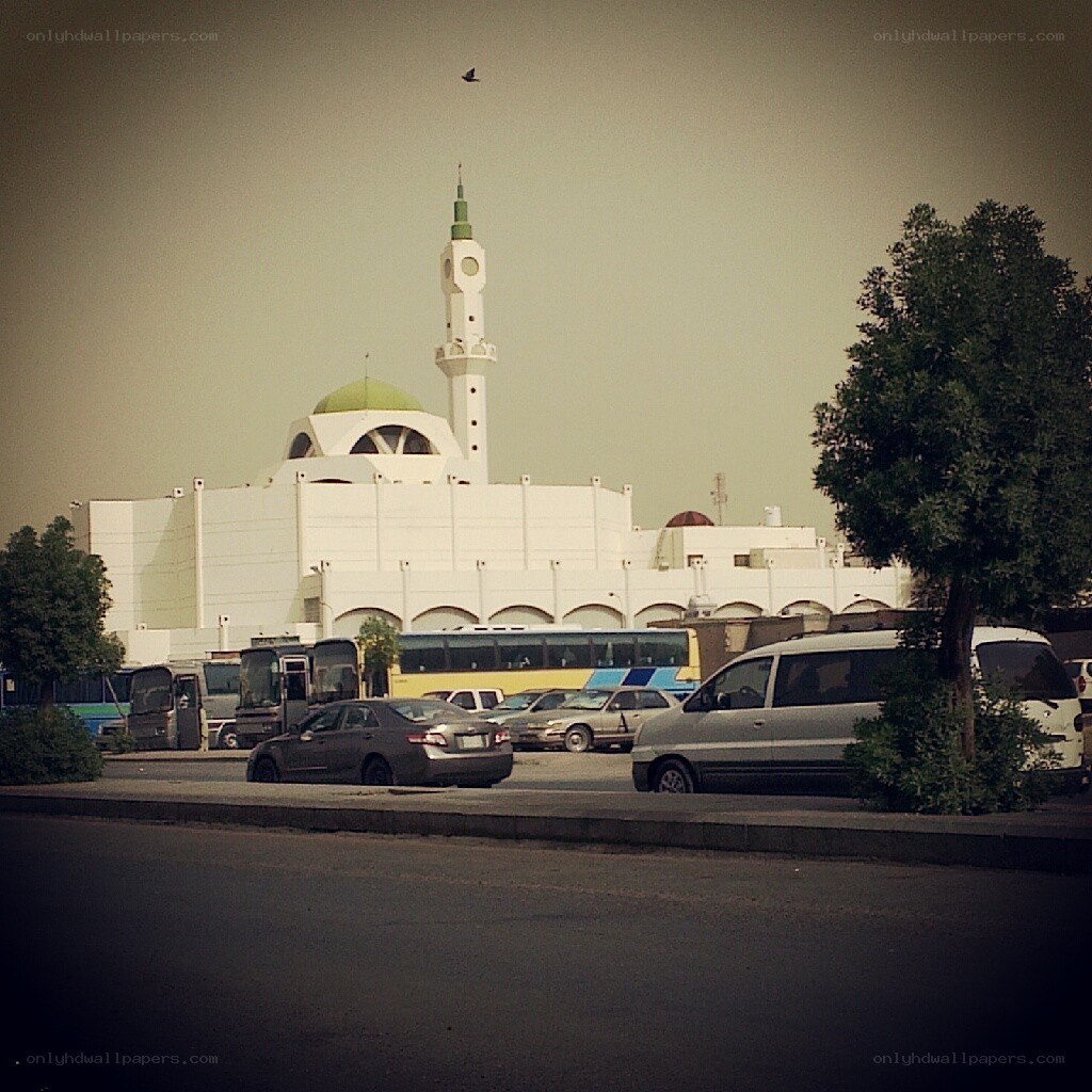 Mosque with minaret and traffic