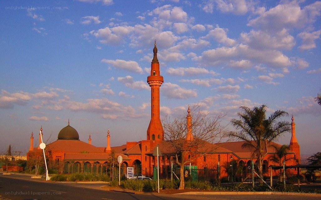 mosque with minaret at sunset