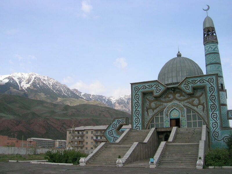Mosque with mountain backdrop