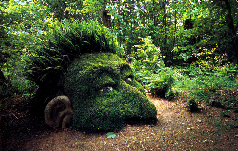 moss-covered head sculpture
