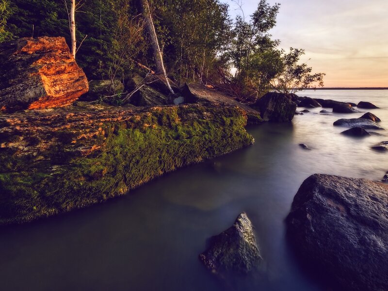 Moss-covered Rocks at Lake