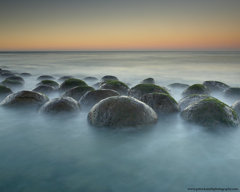 Moss-covered Rocks at Shore — Blue, Serene, Sunset, Photograph