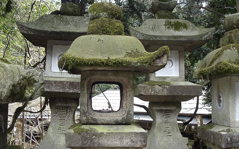 moss-covered stone lanterns