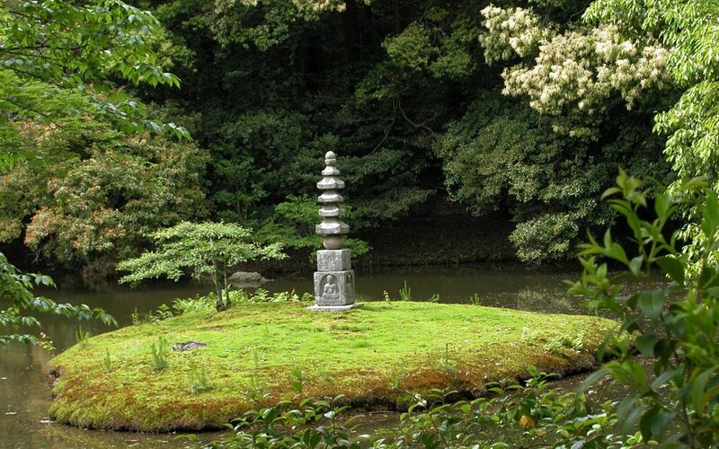 Mossy island with stone pagoda
