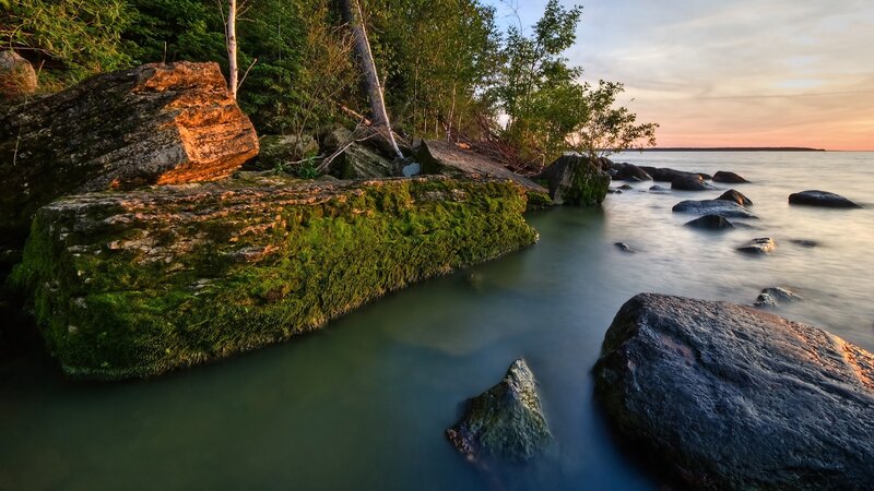 Mossy rocks at sunset
