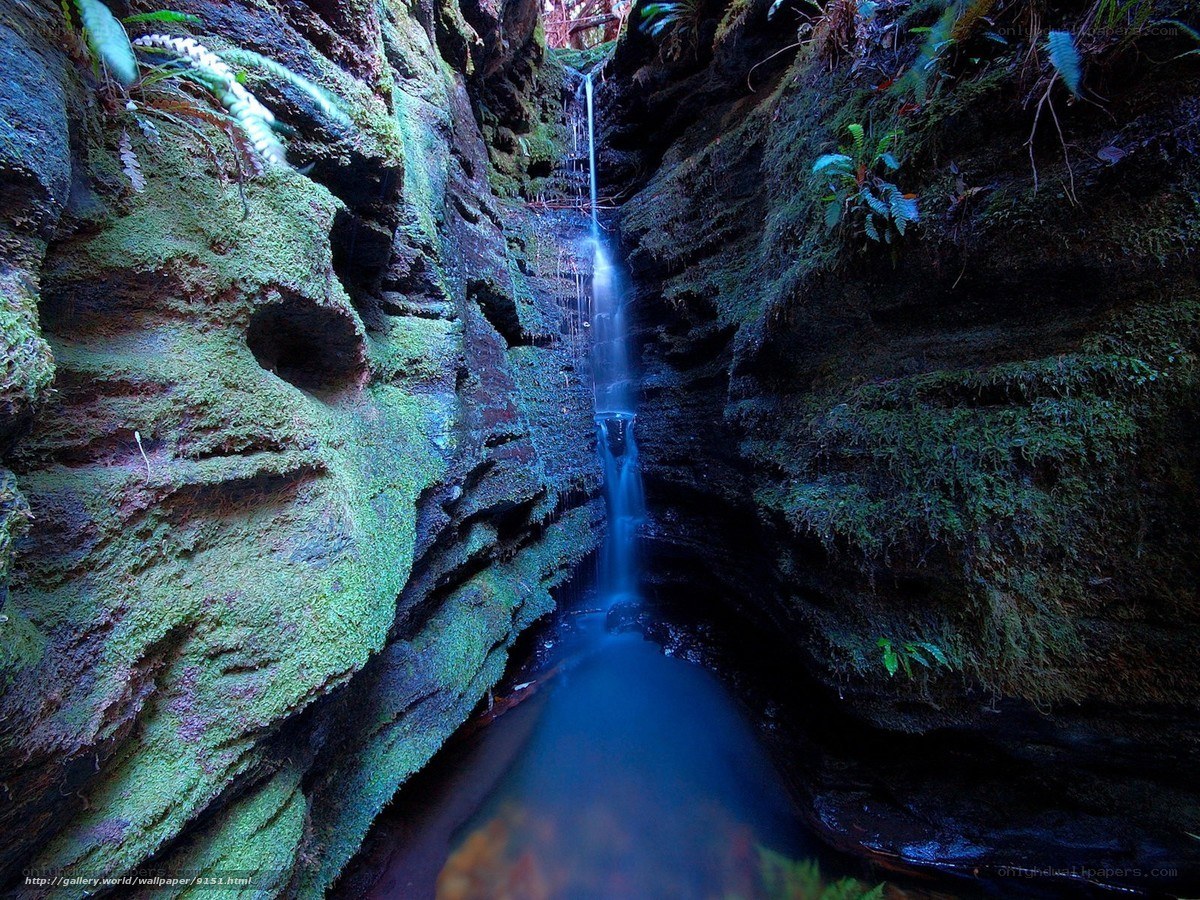 Mossy waterfall in a canyon