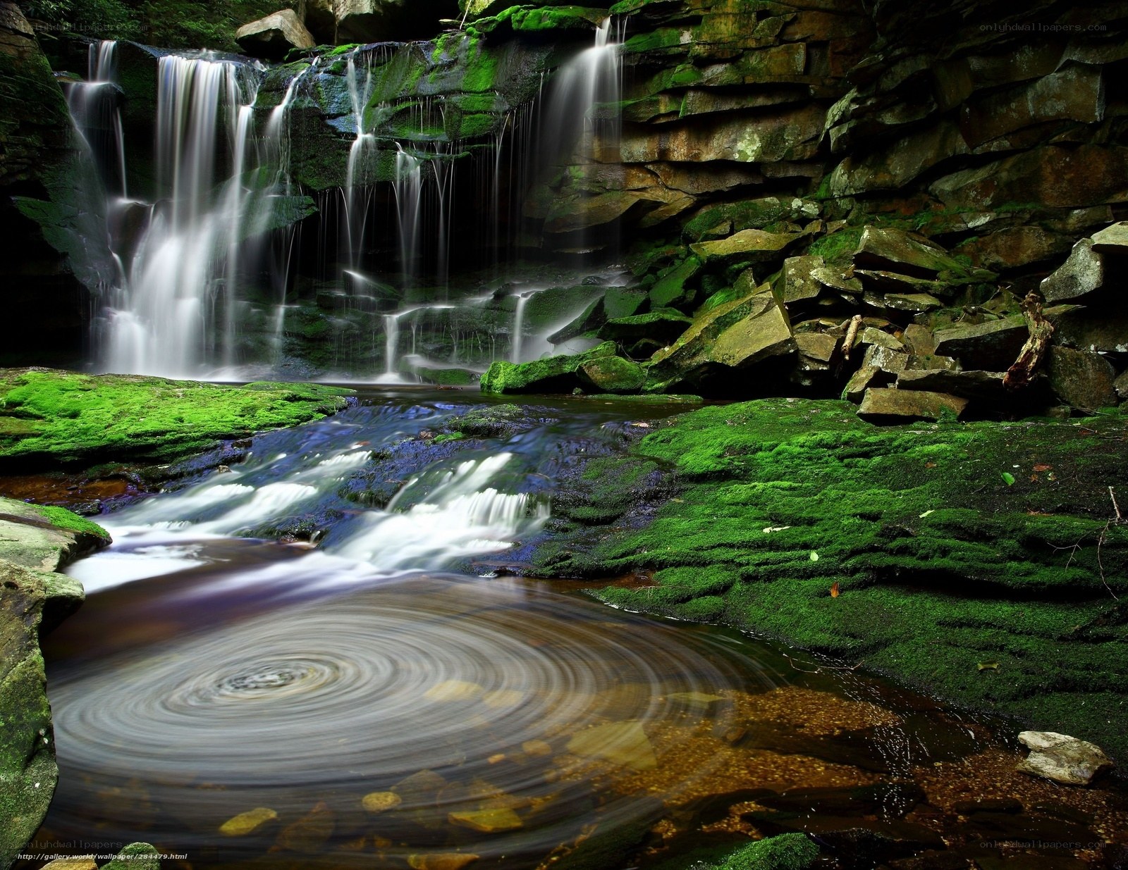 Mossy waterfall in forest