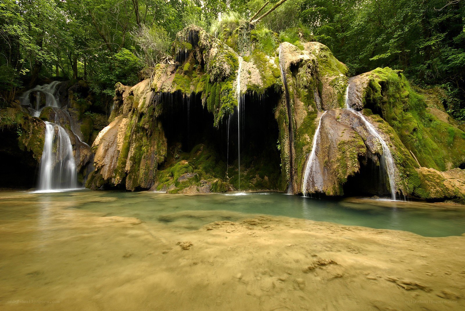 Mossy waterfall in forest