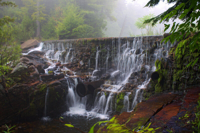 Mossy Waterfall with Pipes