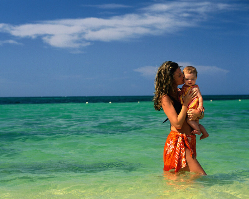 Mother and baby at the beach