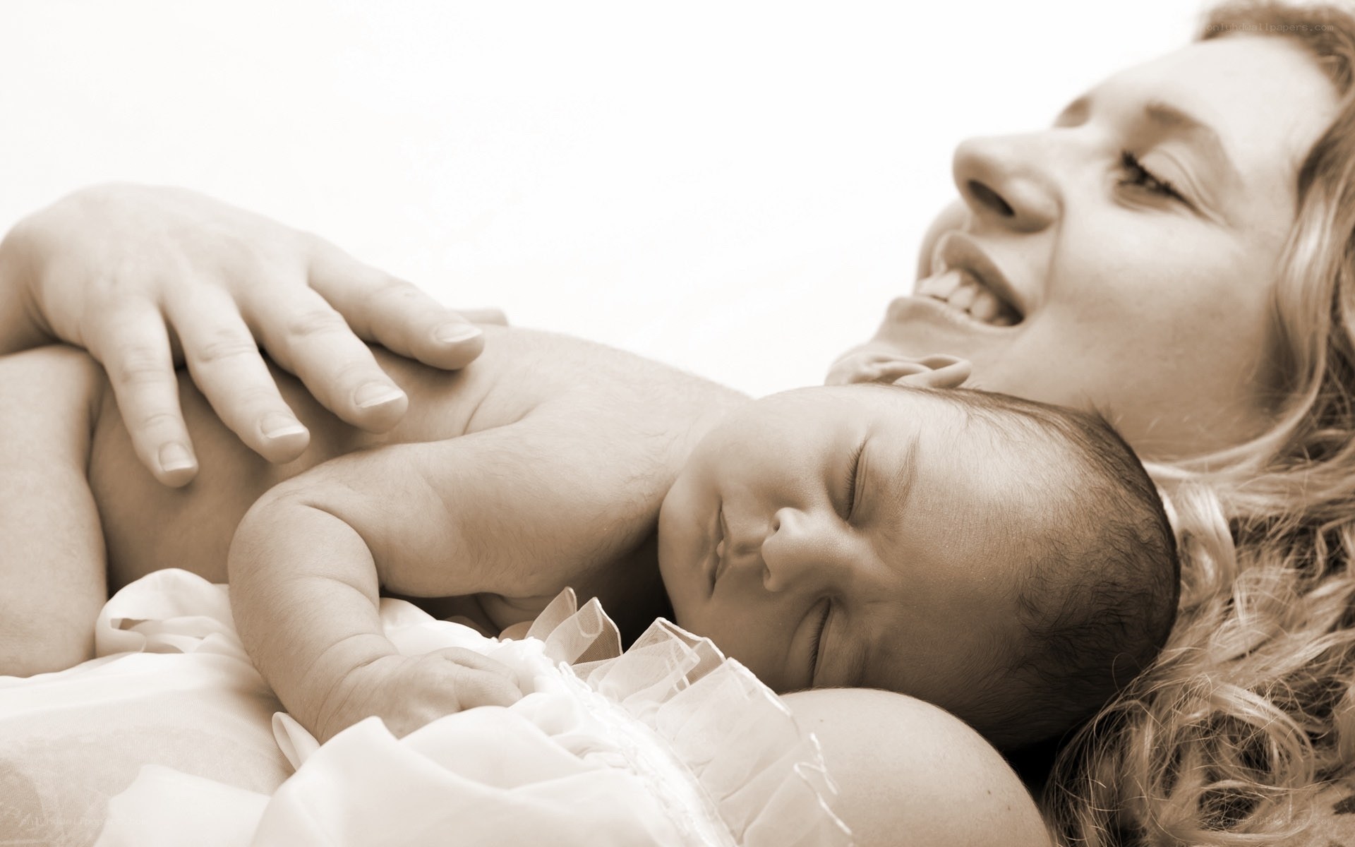 Mother and baby sleeping together