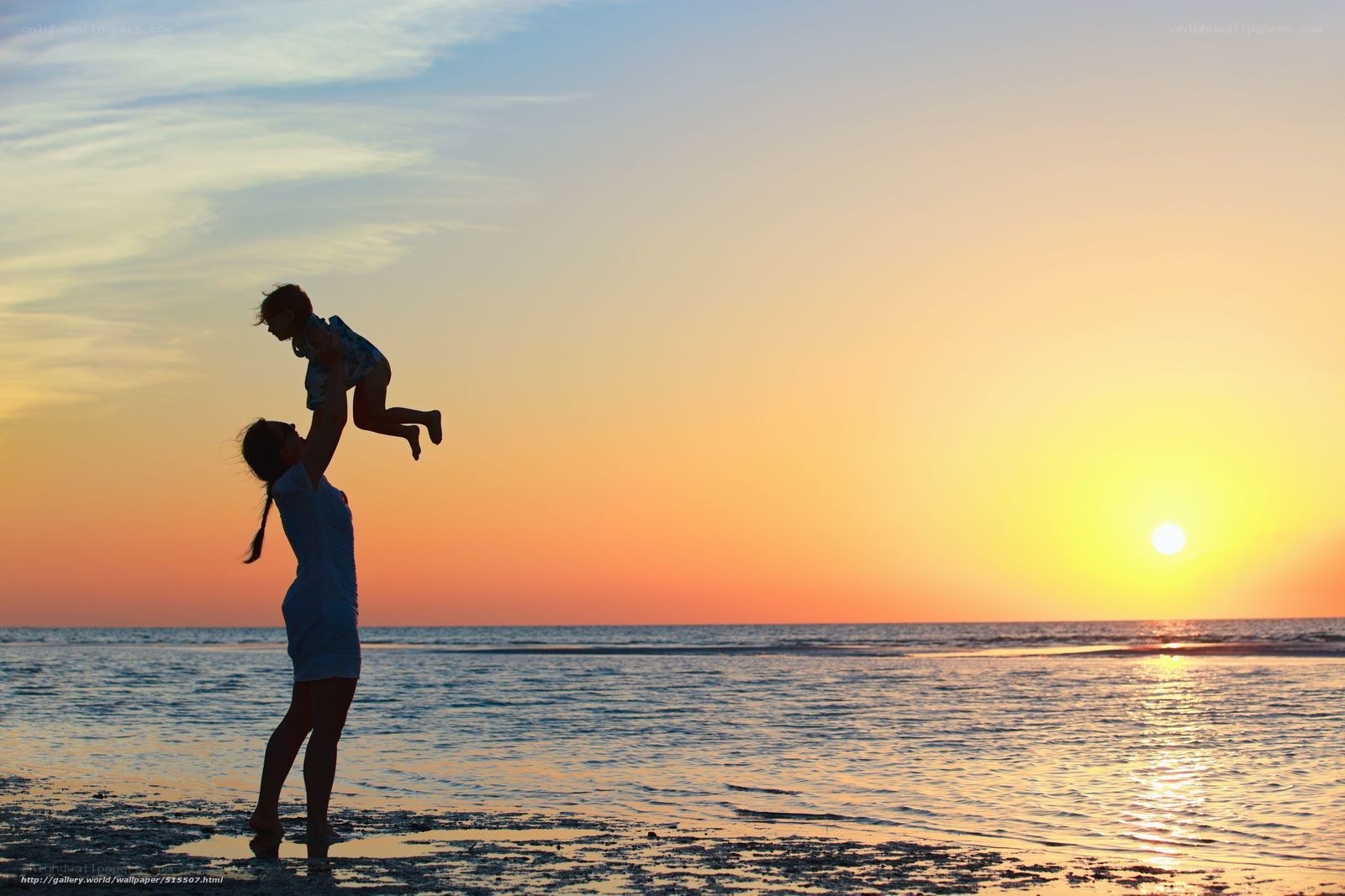 Mother and child at sunset