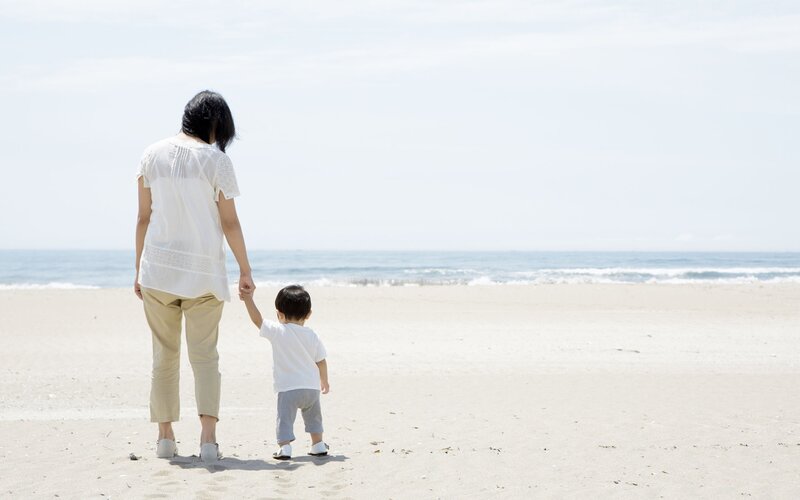 Mother and child at the beach