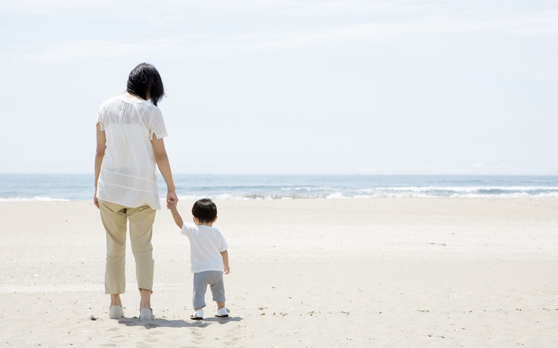 Mother and child at the beach