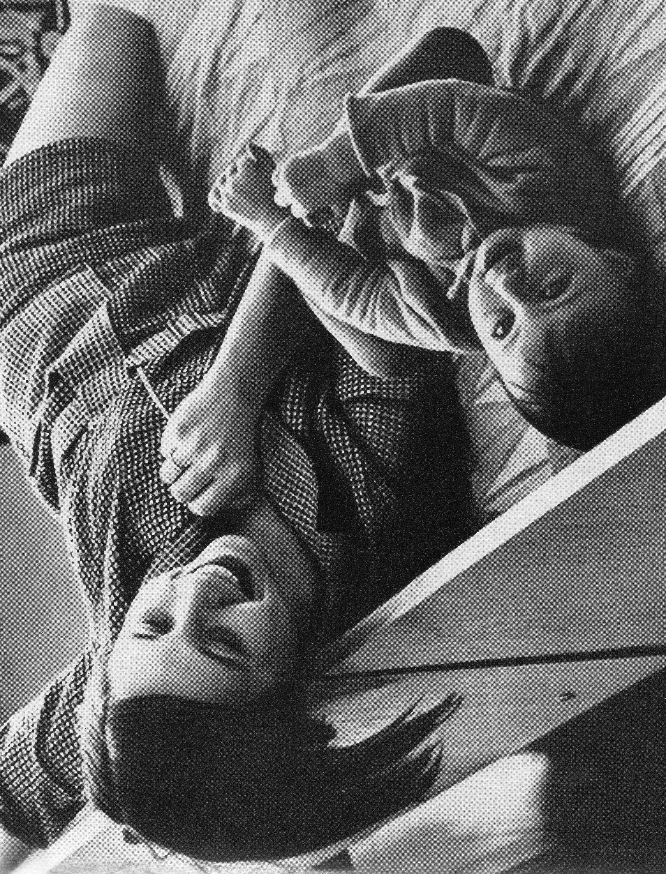 Mother and child lying together