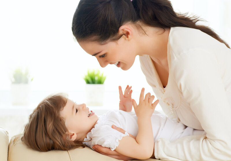 Mother and Child Playing — White