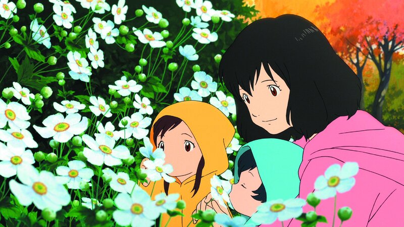 Mother and children in a flower field