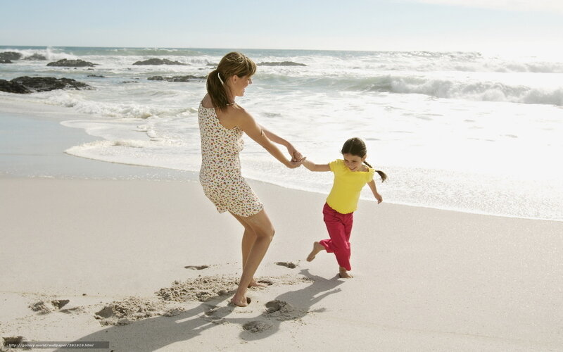 Mother and daughter at the beach