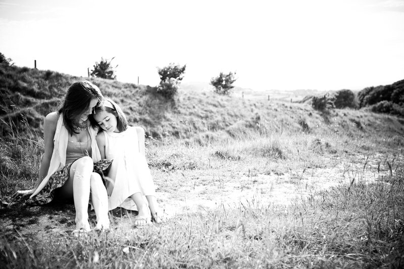 Mother and daughter in a field