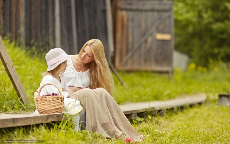 Mother and daughter in garden