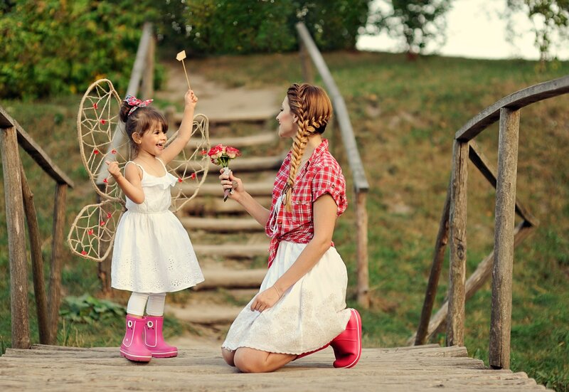Mother and Daughter on Bridge