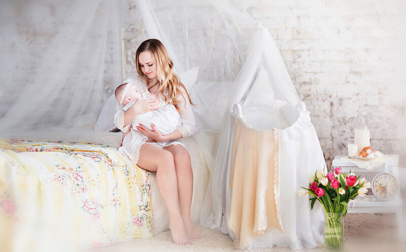 Mother Holding Baby — White, Serene