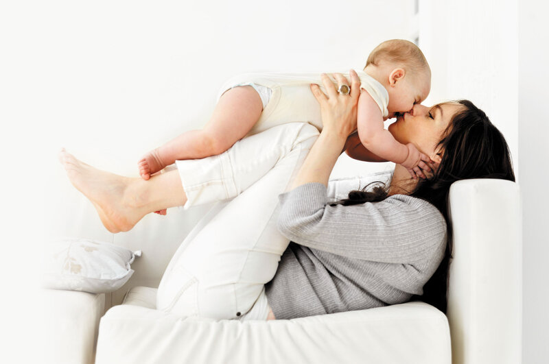 Mother Holding Baby — White