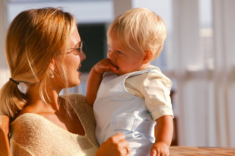 Mother holding her baby