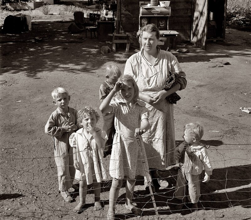 Mother with children in a camp
