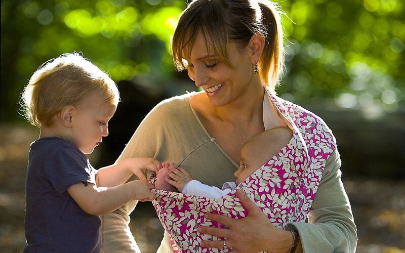 Mother with children outdoors