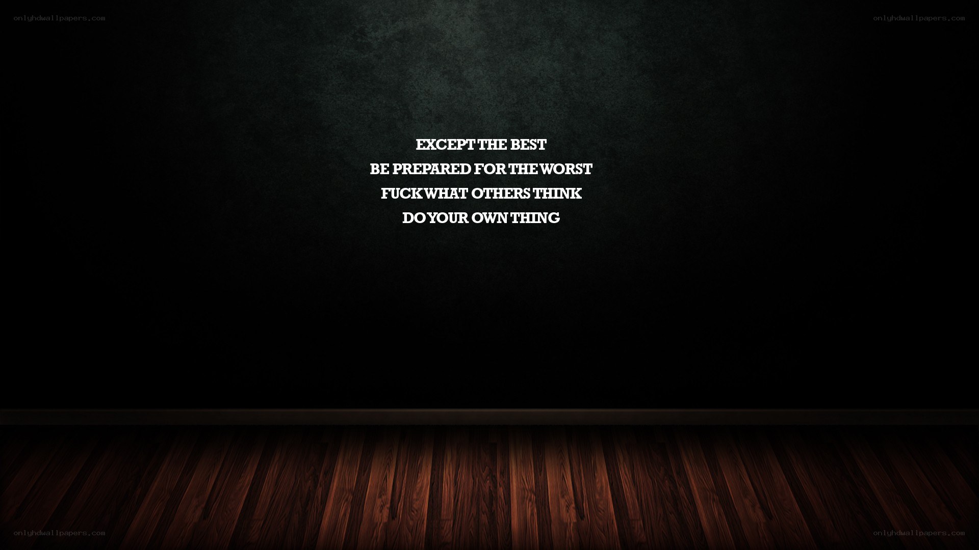 motivational quote on dark wall