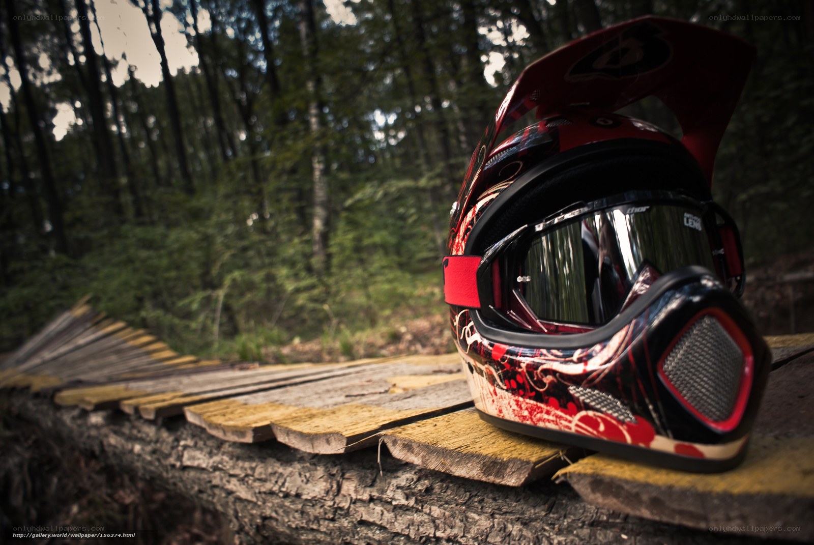 Motocross helmet on wooden bridge