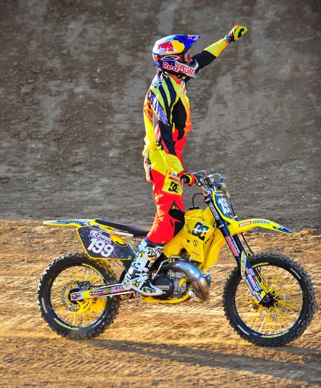 Motocross rider celebrates victory
