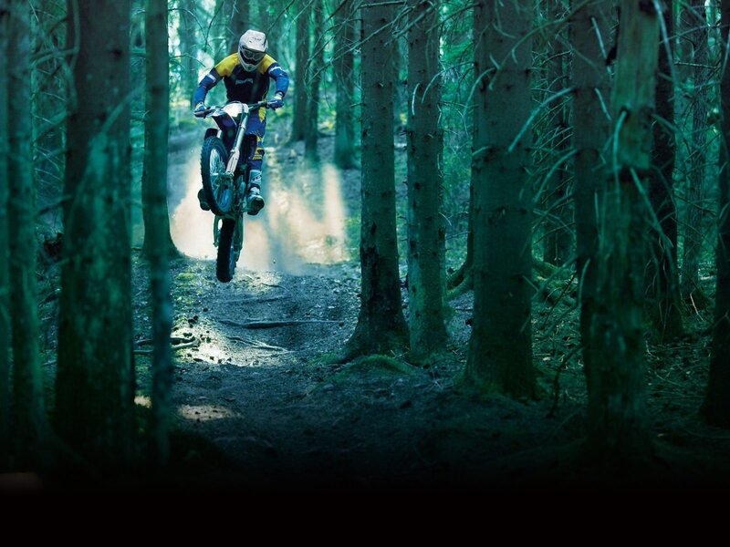 Motocross rider in forest