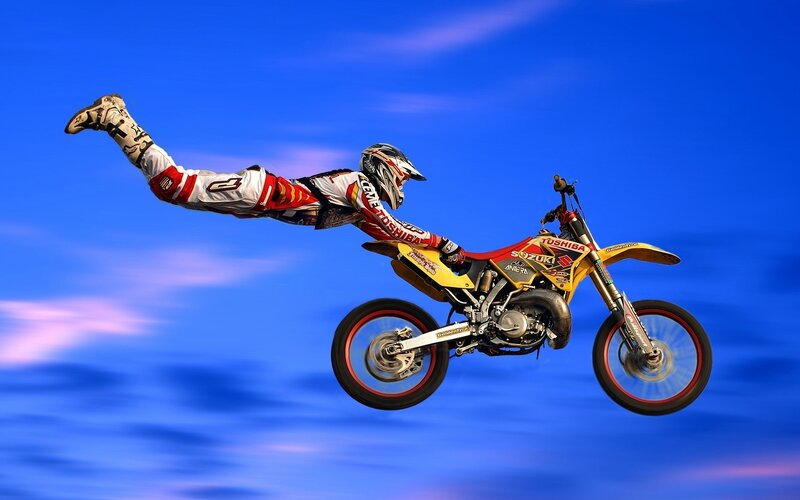 Motocross Rider in Mid-air — Blue, Dramatic